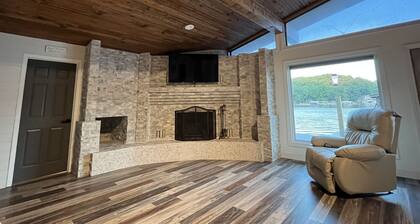 Lake Front Home with 3 steps to water, private dock, quiet cove & flat yard