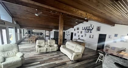 Lake Front Home with 3 steps to water, private dock, quiet cove & flat yard