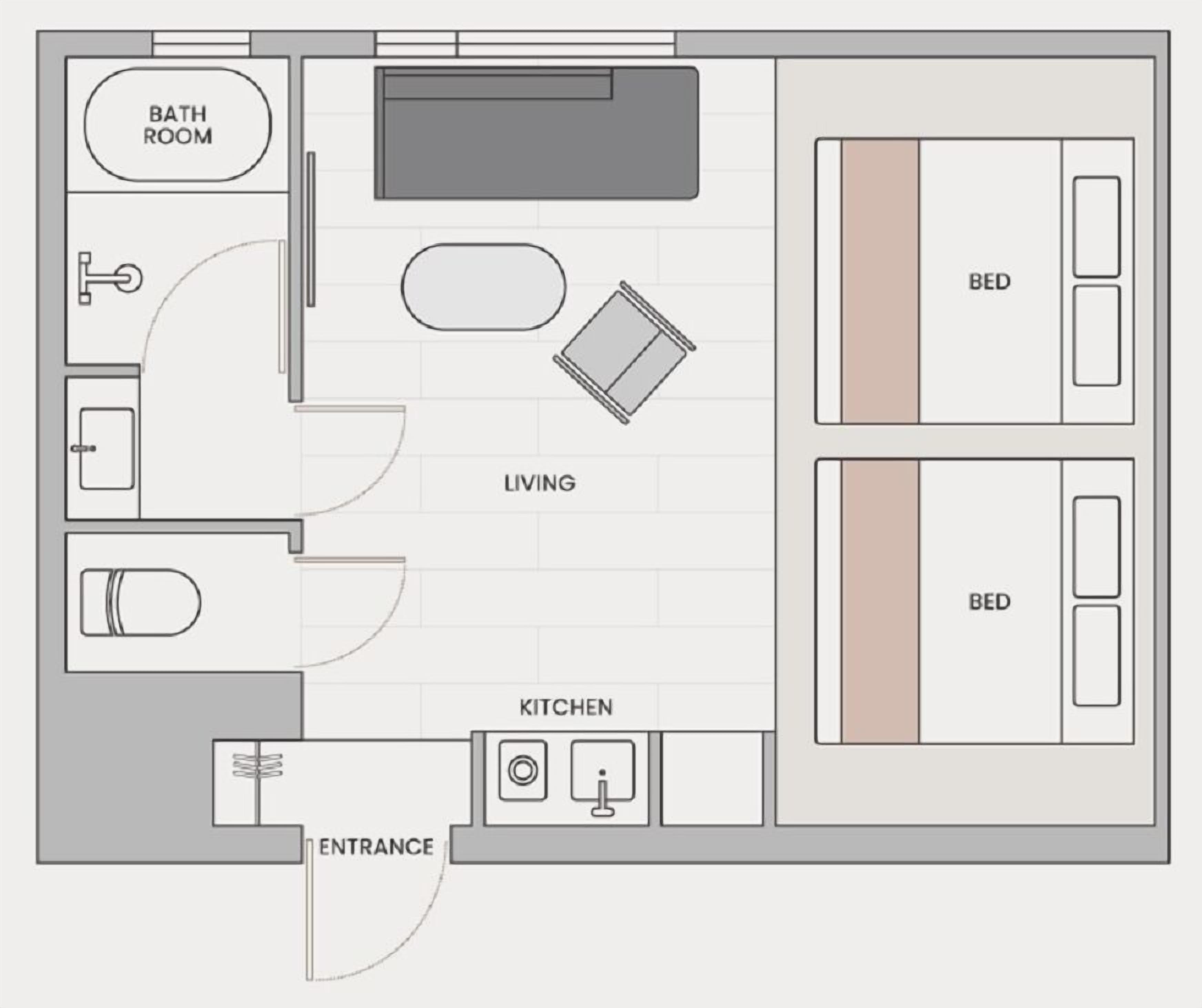 A floor plan of a hotel room with a living area, two bedrooms, a bathroom, and a kitchen.