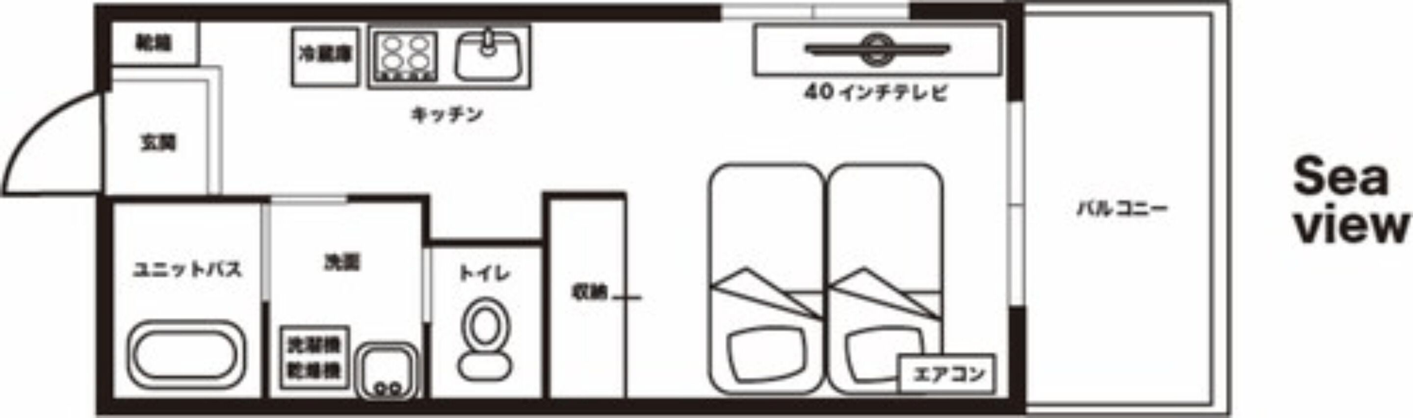 A hotel room layout with a sea view, kitchenette, bathroom, and a seating area with a TV.