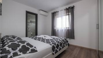 Apartment, 3 Bedrooms, Balcony, Garden View | 3 bedrooms