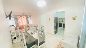 Apartment, 4 Bedrooms, Patio, Garden View | Dining room
