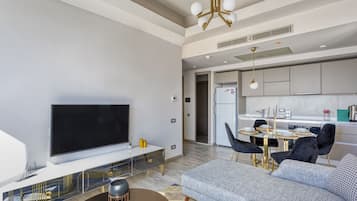 Deluxe Apartment, 1 Bedroom, City View | 1 bedroom, in-room safe, iron/ironing board, free WiFi
