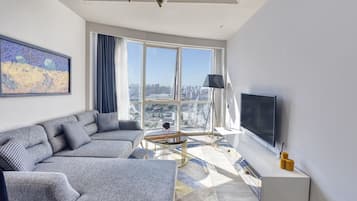 Deluxe Apartment, 1 Bedroom, City View | 1 bedroom, in-room safe, iron/ironing board, free WiFi