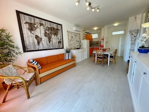 Apartamento, 1 quarto, sacada, vista para o oceano | Sala de estar