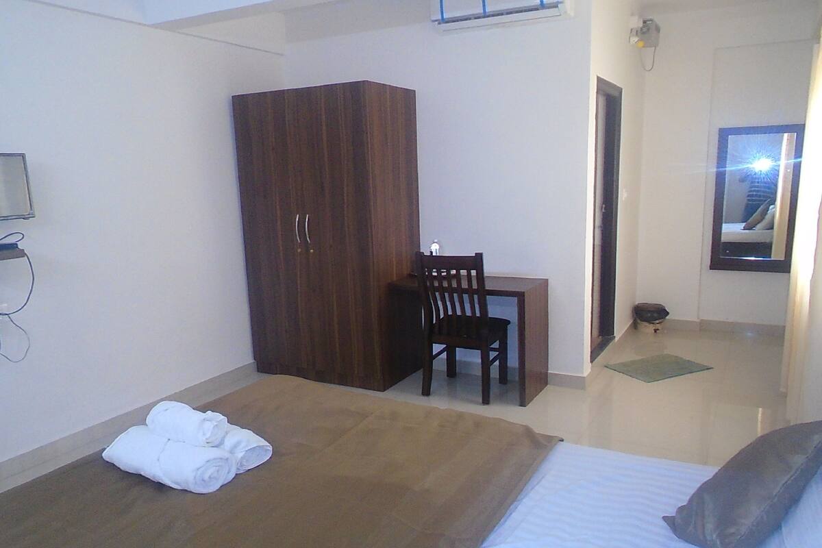 Premium Room (AC) | Premium bedding, desk, free WiFi, bed sheets