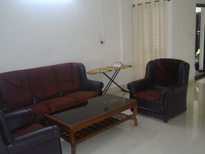 Family Studio | Living area | 24-inch LCD TV with cable channels, TV - Siri Delight (Bengaluru)