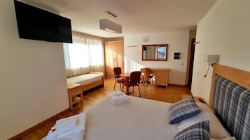 Basic Quadruple Room | Hypo-allergenic bedding, down comforters, desk, travel crib