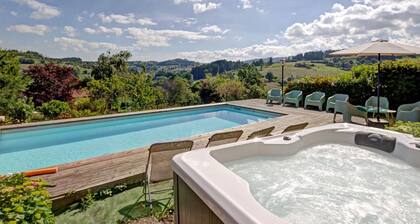 Maison de campagne avec piscine, spa et jeux extérieurs dans le Haut Beaujolais