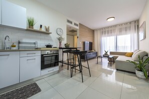 Familienapartment, 2 Schlafzimmer, zum Garten hin | Eigene Küche