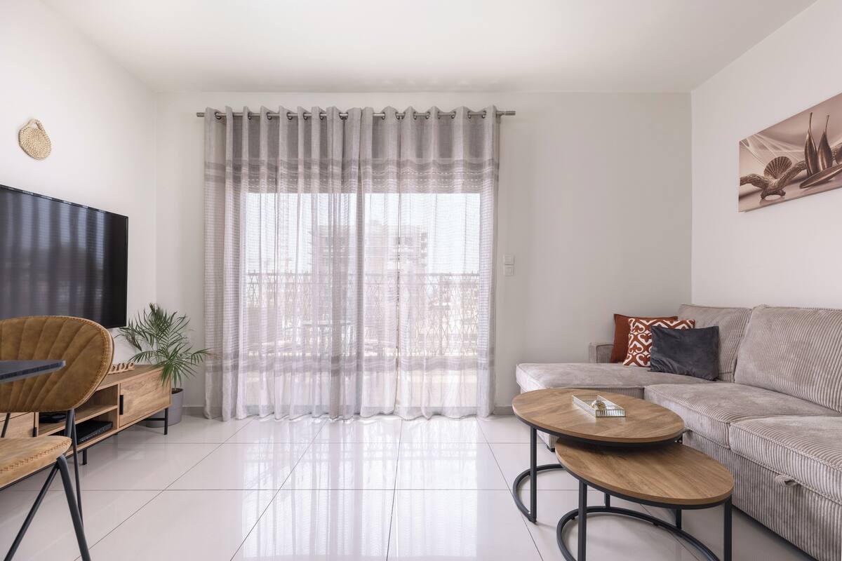 City Apartment, 1 Queen Bed with Sofa bed, Balcony, City View | Living area | 55-inch flat-screen TV with cable channels, TV
