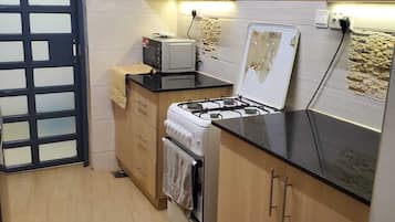 Apartemen | Dapur pribadi | Lemari es besar, microwave, dan oven