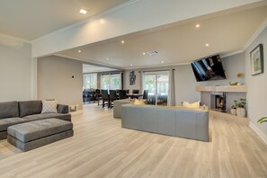Smart TV, fireplace, books, video library