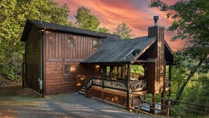 A rustic cabin with a porch and a chimney, surrounded by trees. - Endless Views, Secluded Cabin Hot Tub & Fireplaces (Blue Ridge)
