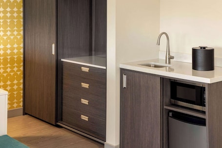 Studio Suite, 1 King Bed, Non Smoking | Desk, laptop workspace, iron/ironing board, free WiFi. The Orbit Hotel, Trademark Collection by Wyndham