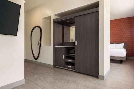 Basic Room, 1 King Bed, Non Smoking | Desk, laptop workspace, iron/ironing board, free WiFi. The Orbit Hotel, Trademark Collection by Wyndham