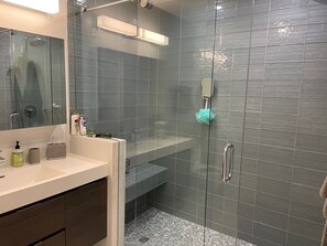 Combined shower/tub, hair dryer, towels, soap
