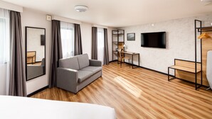 Superior Room, 1 King Bed with Sofa bed | Living area | LCD TV - Ibis London Heathrow Terminal 5 (Slough)