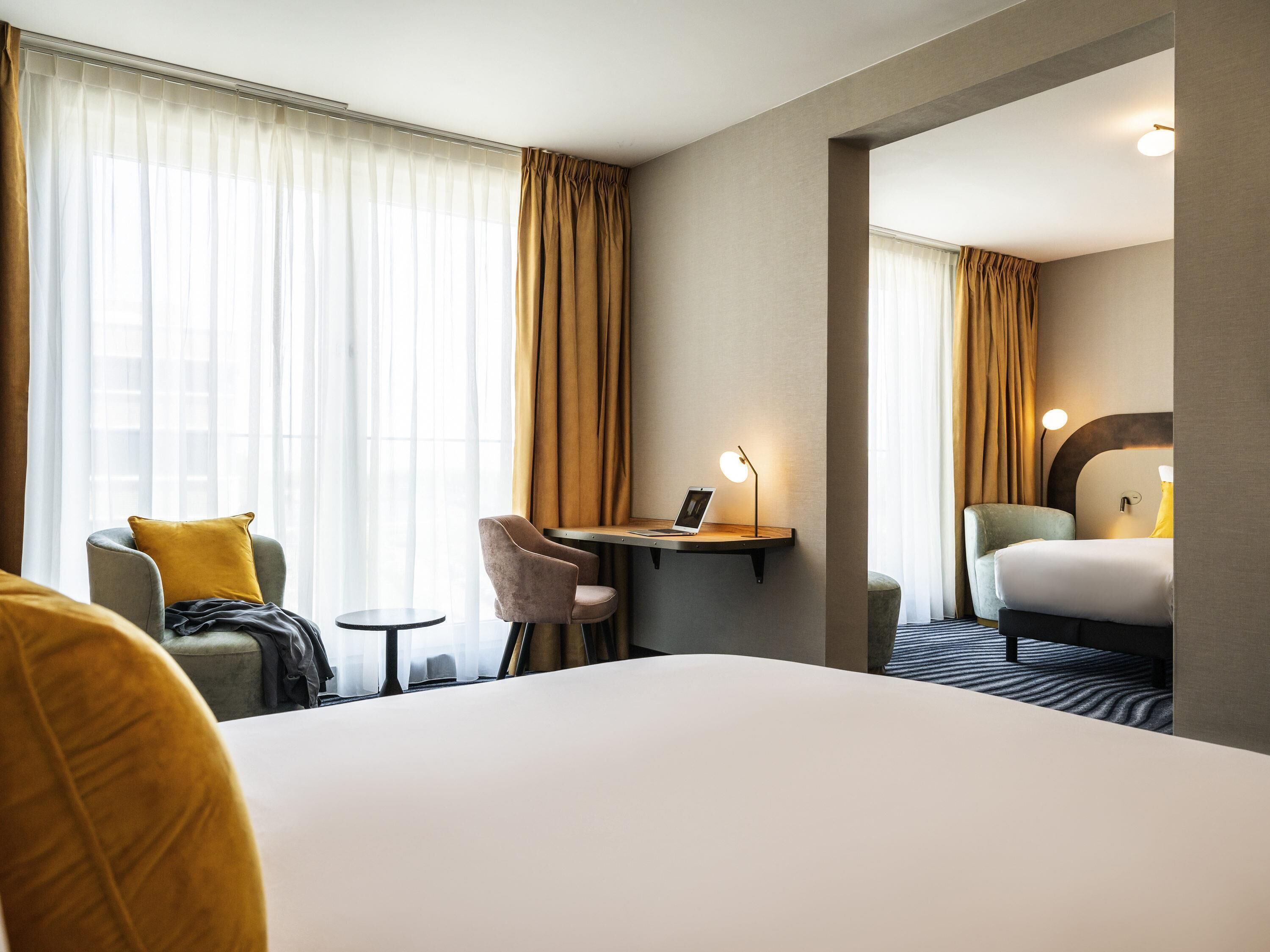 Superior Room, Multiple Beds | Minibar, in-room safe, desk, laptop workspace