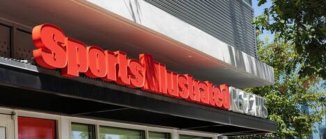A building with a prominent sign reading 'Sports Illustrated Resorts.'