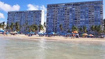 On the beach, beach towels