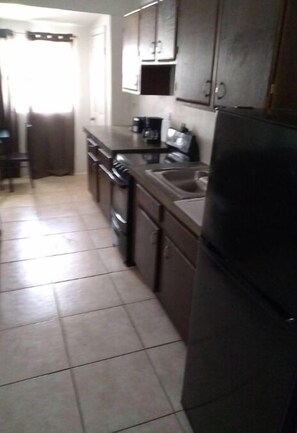 Private kitchen - The beach is our back yard apt #1A (Bahamas)