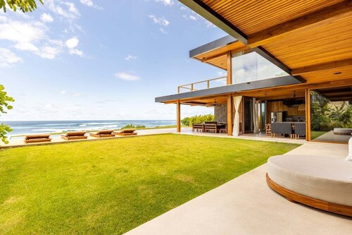 Luxury oceanfront villa, infinity pool + housekeeping & concierge included.