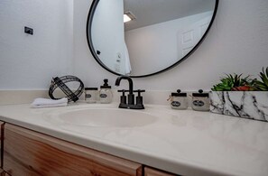 Combined shower/bathtub, jetted bath, hair dryer, bidet