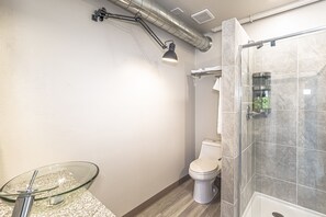 Shower, towels, soap, toilet paper