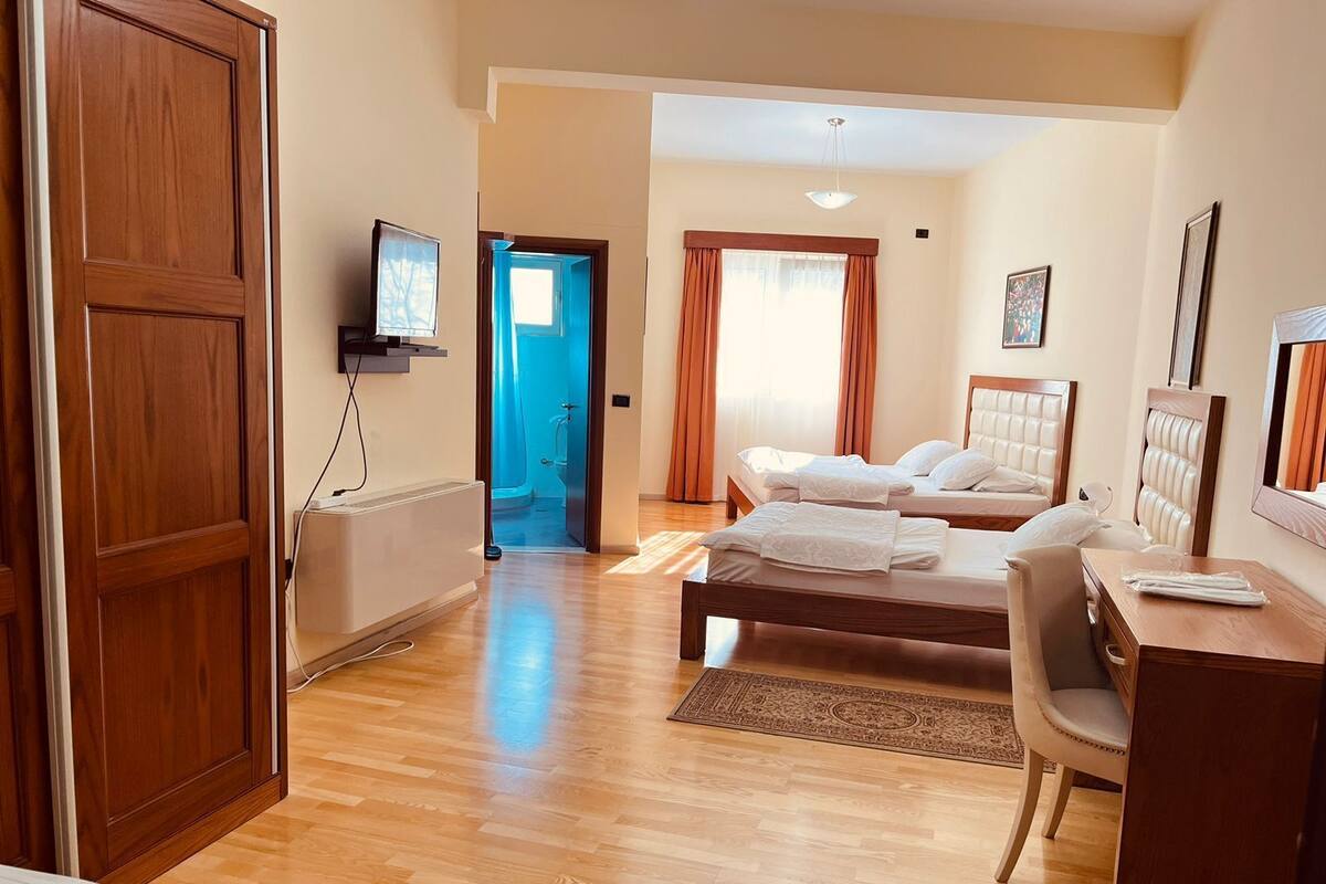 Standard Triple Room | Down comforters, desk, laptop workspace, blackout drapes