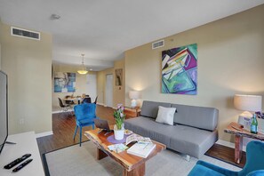 Premium Apartment, 2 Bedrooms, City View | Living area | 50-inch TV with digital channels, streaming services