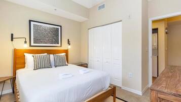 Premium Apartment, 2 Bedrooms, Pool Access | 1 bedroom, premium bedding, laptop workspace, iron/ironing board