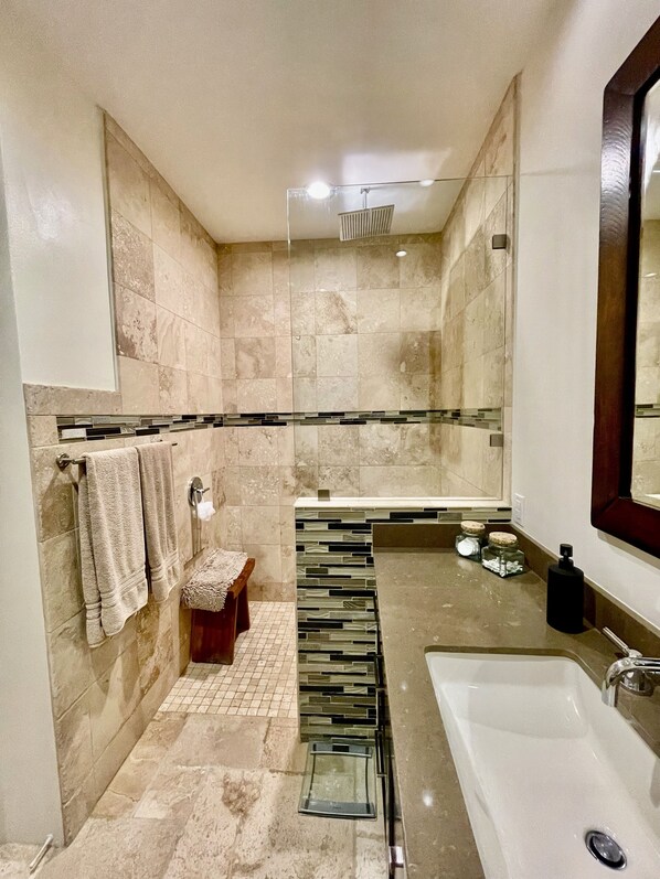 Shower, hair dryer, towels, soap