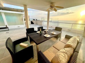 Outdoor dining - BEACHFRONT PENTHOUSE with PRIVATE POOL (Nuevo Vallarta)