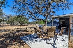 Outdoor dining - Secluded, Dog-Friendly Getaway w/ Beautiful Views, a Large Yard, & Free WiFi (Fredericksburg)