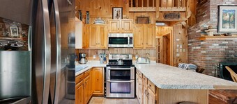 Charming, dog-friendly cabin with a full kitchen, free WiFi, & private hot tub