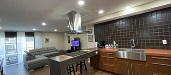 Condo w/ oversize garage, walking distance to grocery, restaurants, bars, beach