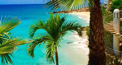 Oceanside Escape at Rainbow Beach Club – Pools, Views & Private Beach Access