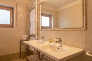 Bathtub, hair dryer, towels
