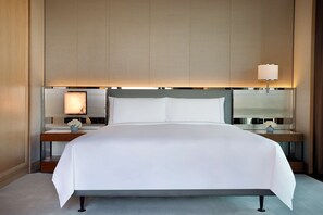 Premium bedding, down comforters, pillowtop beds, minibar