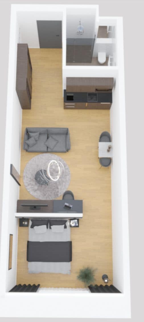 A floor plan of a modern apartment with a living area, kitchen, and a small balcony.
