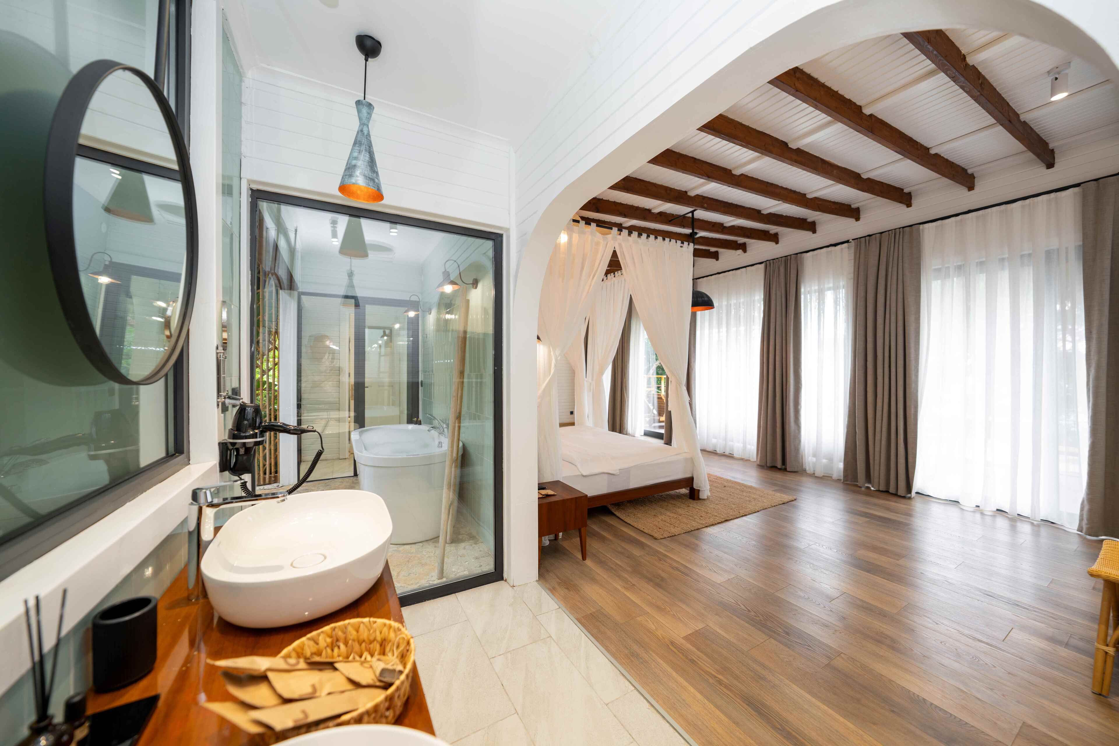 Secret Garden House | Bathroom | Separate tub and shower, rainfall showerhead, free toiletries