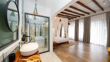 Secret Garden House | Bathroom | Separate tub and shower, rainfall showerhead, free toiletries