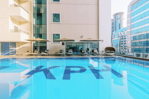 Outdoor pool, pool umbrellas, pool loungers