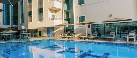 Outdoor pool, pool umbrellas, pool loungers