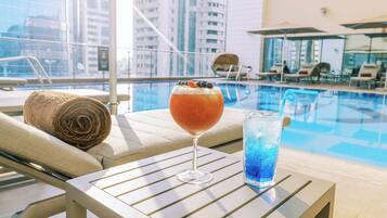 Outdoor pool, pool umbrellas, pool loungers