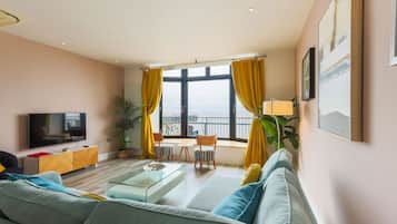 Luxury Apartment (Cliff View) | Living area | 56-inch flat-screen TV with digital channels, TV, Netflix