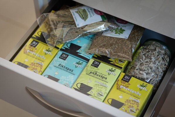 A drawer filled with various packaged food items, including snacks and grains.