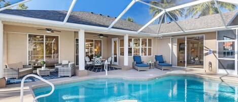 A heated pool, pool loungers