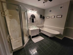 Bathtub, hair dryer, towels, soap
